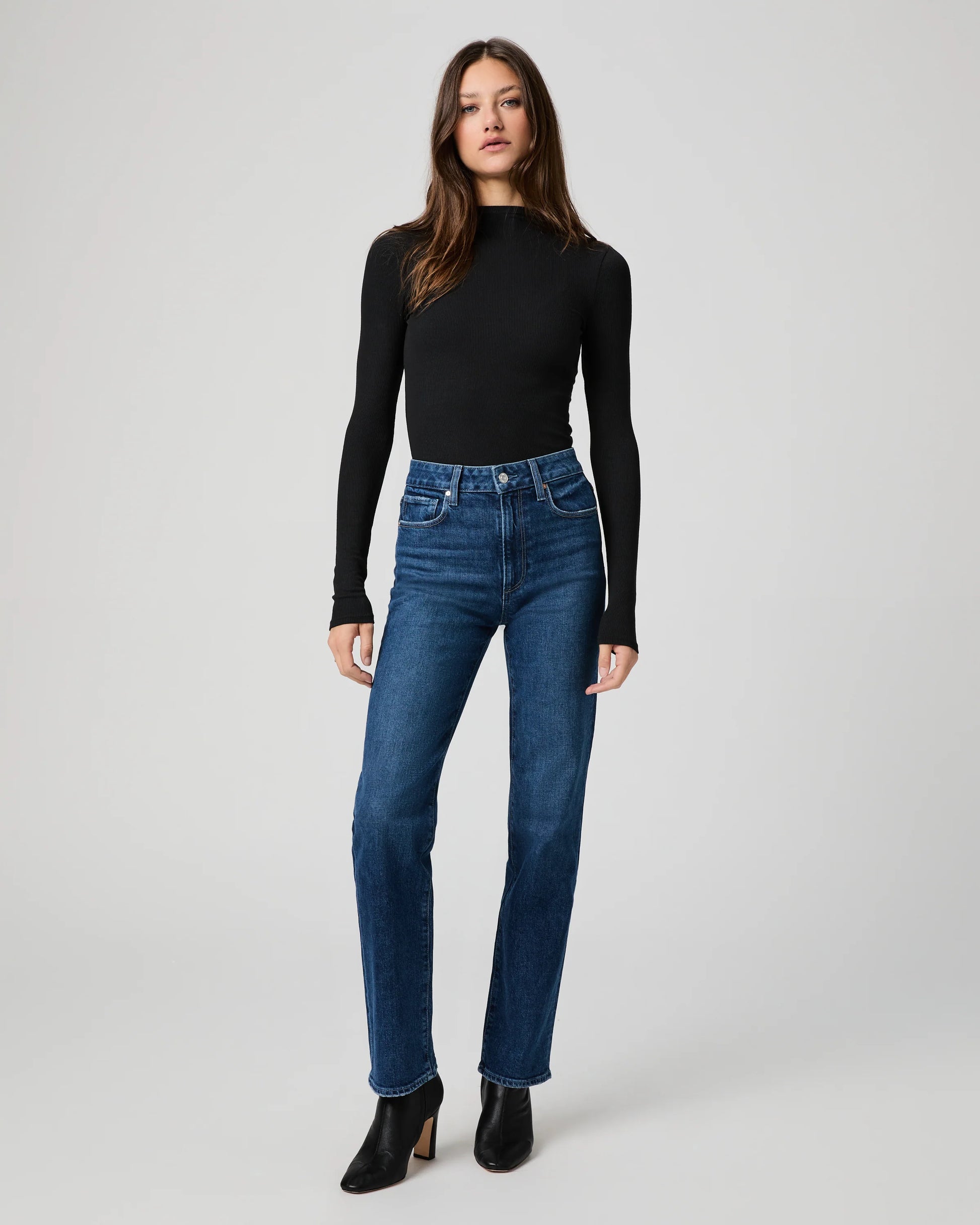 mid blue straight leg jeans worn with black long sleeve tee