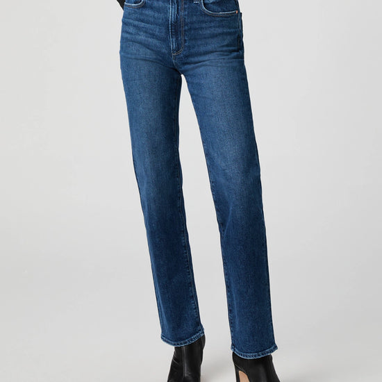 mid blue straight leg jeans worn with black long sleeve tee