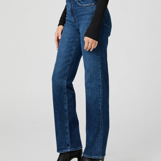 mid blue straight leg jeans worn with black long sleeve tee