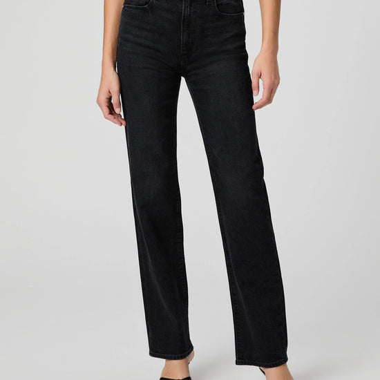 black straight leg jeans worn with open toe sandal