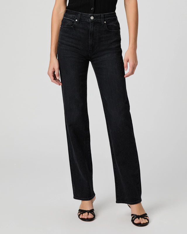 black straight leg jeans worn with open toe sandal