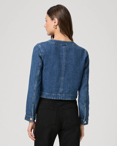 round neck dark blue denim jacket with silver buttons, 2 flap buttoned pockets and cropped fit rear view