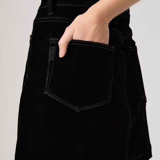 Black mini skirt with button front
