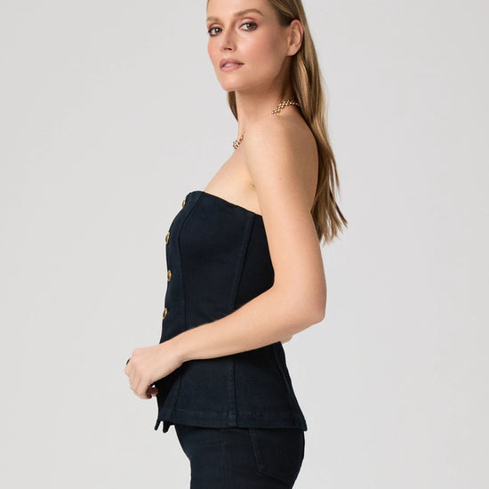Woman wearing a denim strapless top side view from Paige