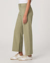 Side view of moss green ankle length jeans