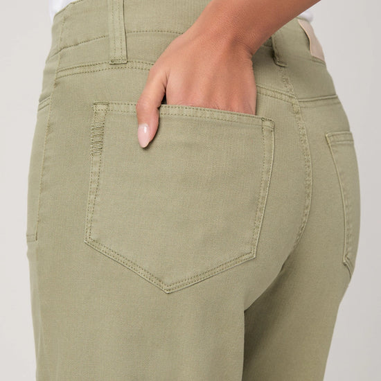 Pocket detail of moss green ankle length jeans from Paige
