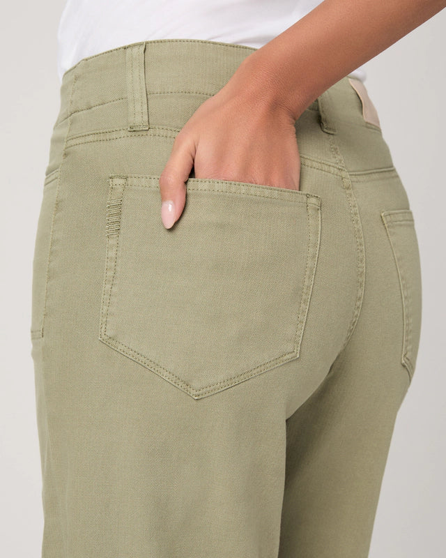 Pocket detail of moss green ankle length jeans from Paige