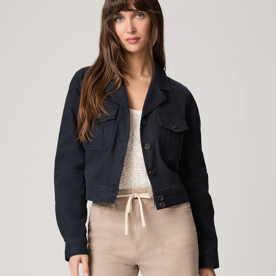 Navy casual jacket with beige trousers from Paige