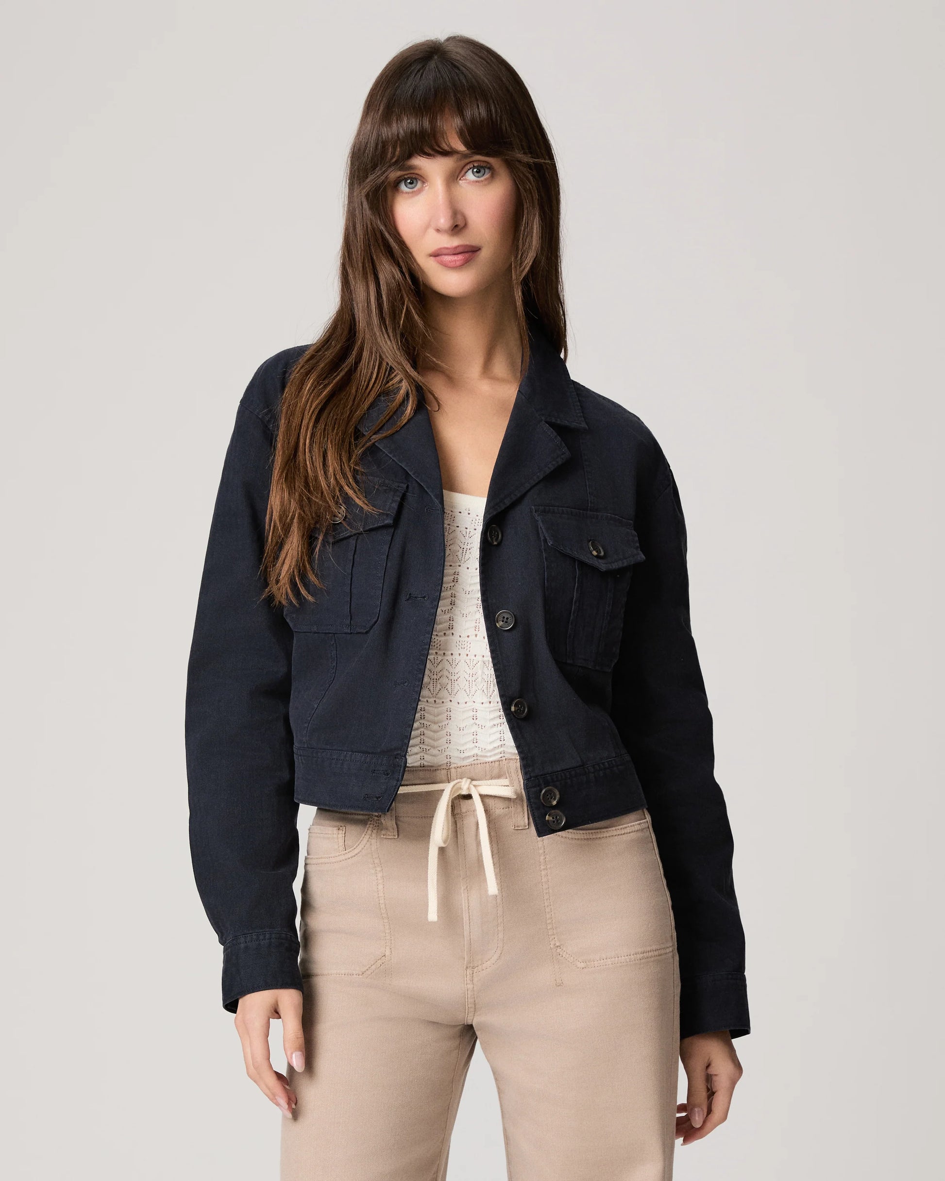 Navy casual jacket with beige trousers from Paige