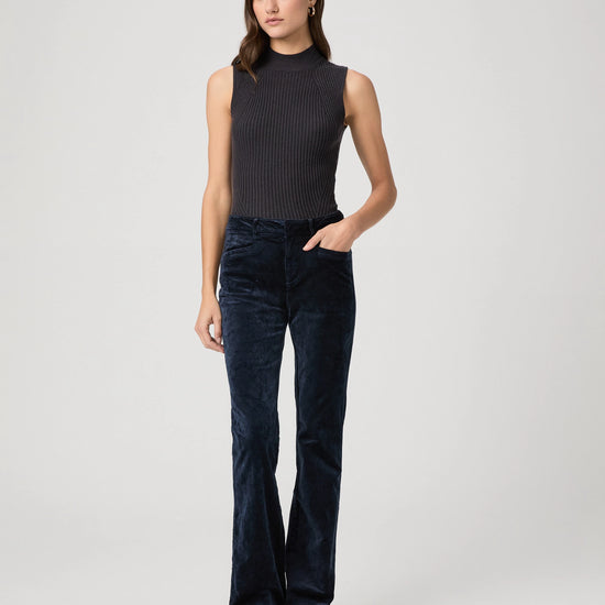 navy velvet corduroy bootcut jeans with high rise and slit pockets model shot