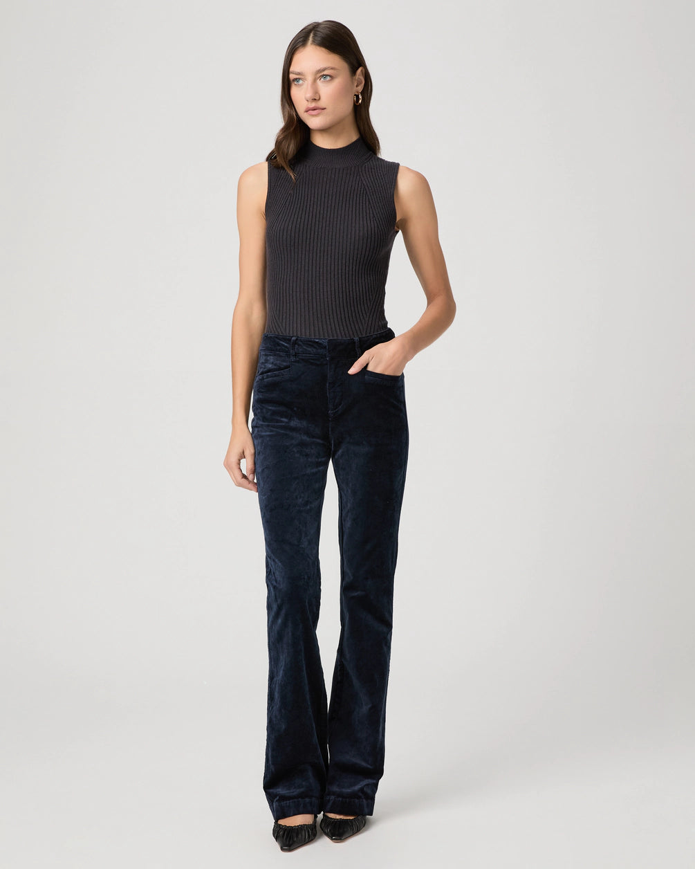 navy velvet corduroy bootcut jeans with high rise and slit pockets model shot