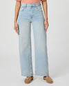 Light blue jeans worn by a person on a white background