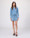 pale wash collarless denim jacket worn with matching skirt from Paige