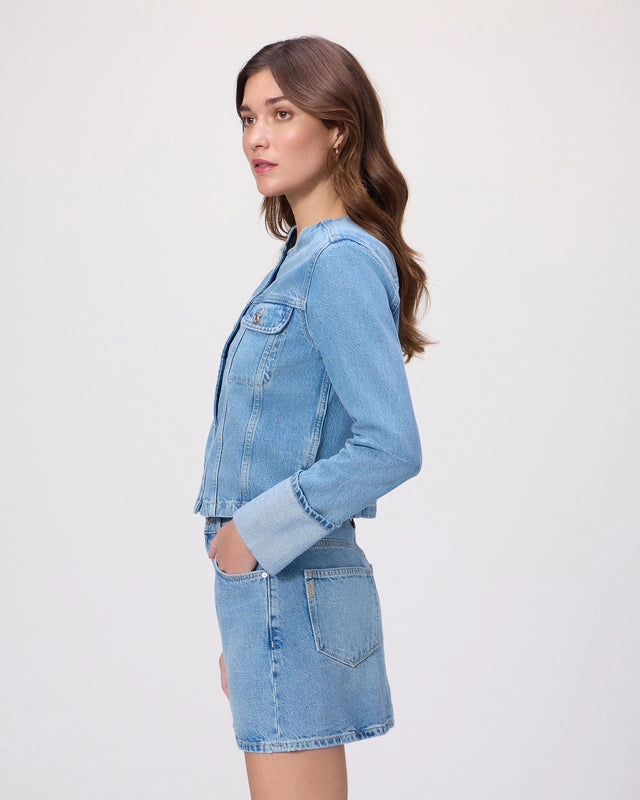 Side view of pale wash denim jacket