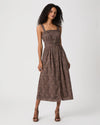 Woman modelling brown paisley dress