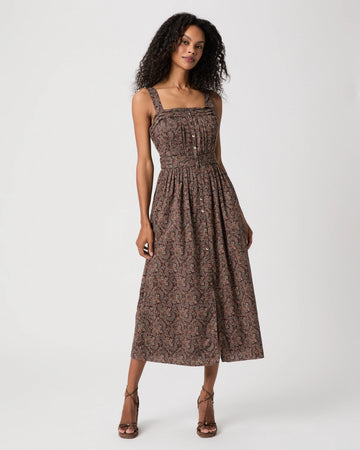 Woman modelling brown paisley dress