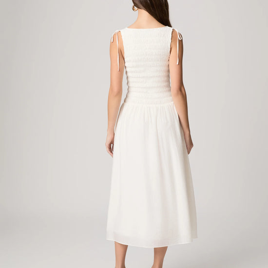 Rear view of white summer dress from Paige