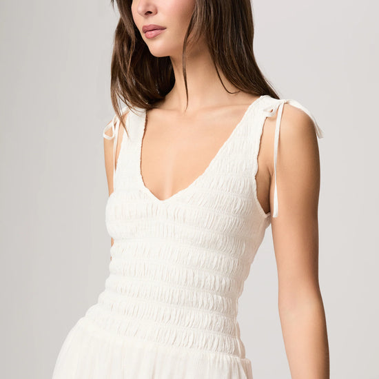 Top detail of white summer dress from paige