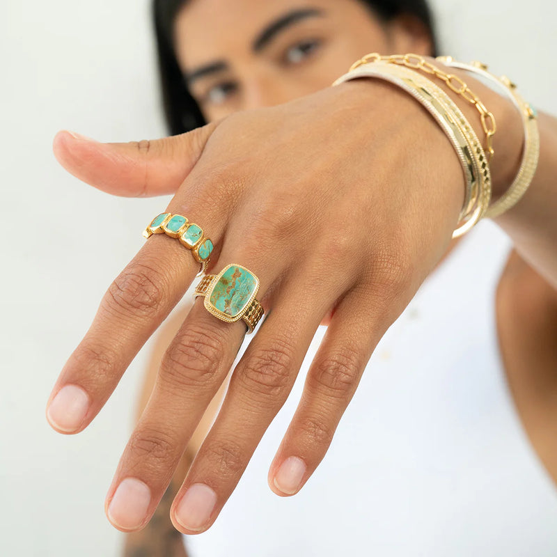 Gold and turquoise stone cocktail ring