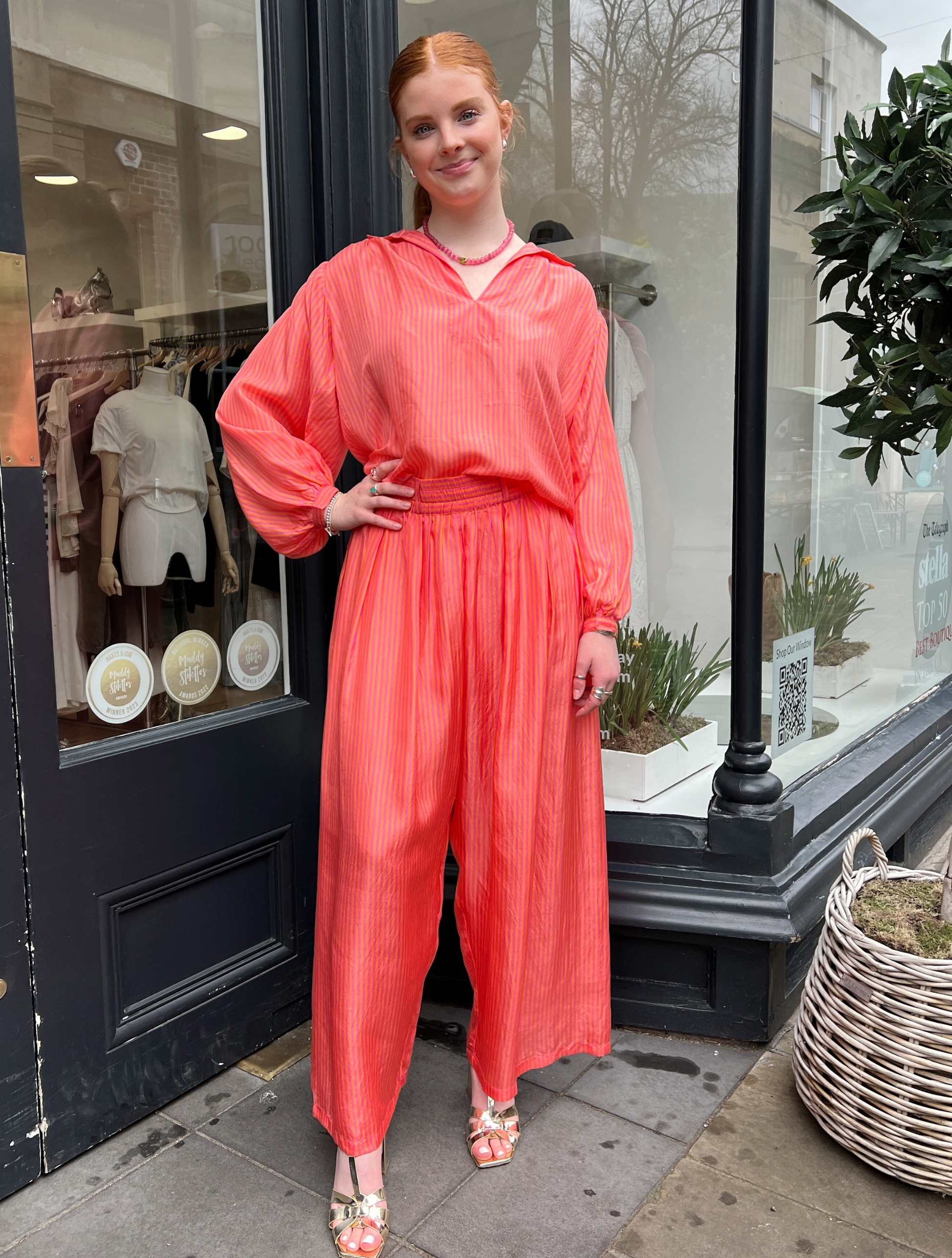 Loose orange and pink stripe trousers\