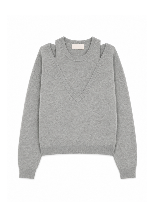 flat lay of a light grey jumper with a mock vest 