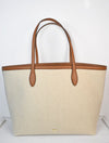 Neutral canvas totoe with tan leather trim