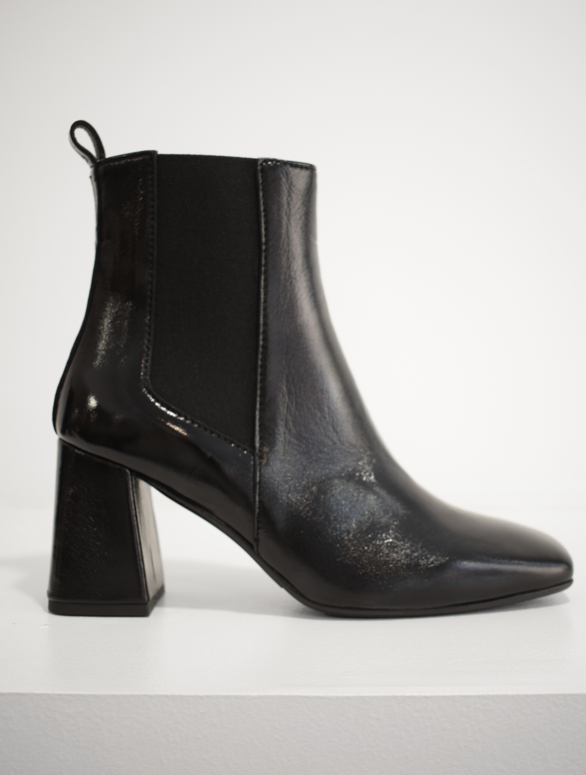 Pull on black patent boot with a block heel