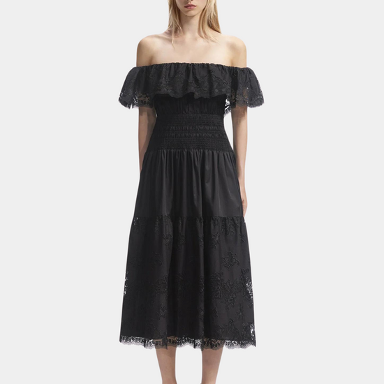 Off the shoulder cotton black dress with lace around the bodice and lace trim with elasticated and ruched waistline