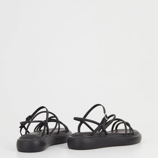 Black strappy chunky sole leather sandals