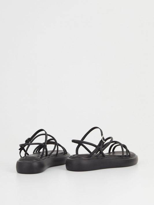 Black strappy chunky sole leather sandals