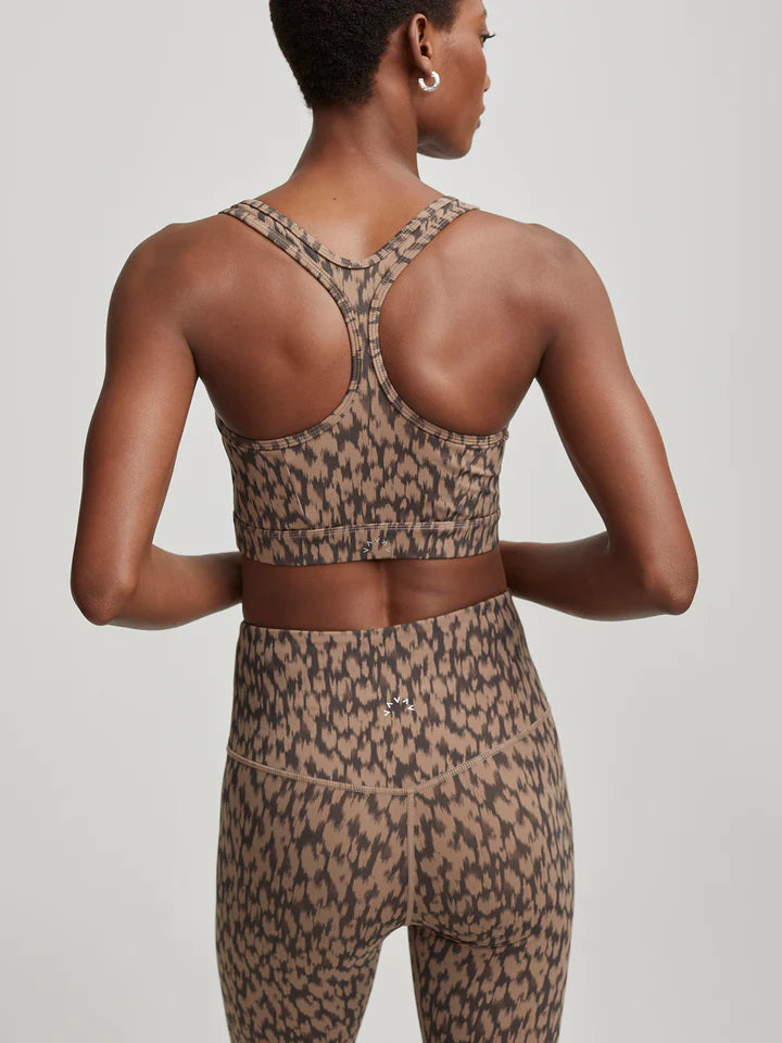 Brown and black animal print sports bra top with razor back and V neckline