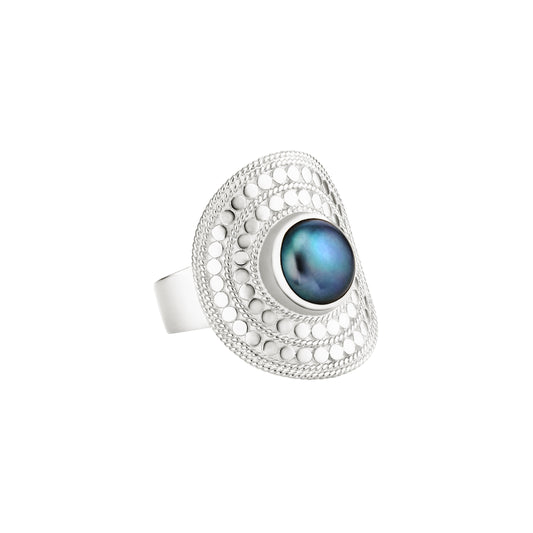 silver dotted saddle ring with blue pearl in the centre