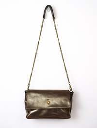 Metallic handbag with removable chain strap and small brass stomp