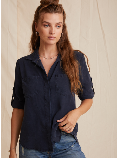 Navy shirt with turn up sleeves and a split back with covered placket
