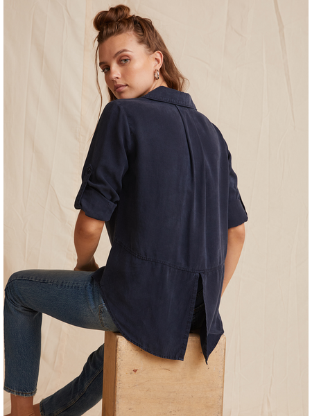 Navy shirt with turn up sleeves and a split back with covered placket