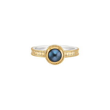 gold dotted ring with a blue pearl in the centre from anna beck