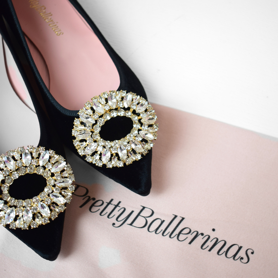 Black velvet pointed toe ballet pumps with gold and diamante brooch on toe