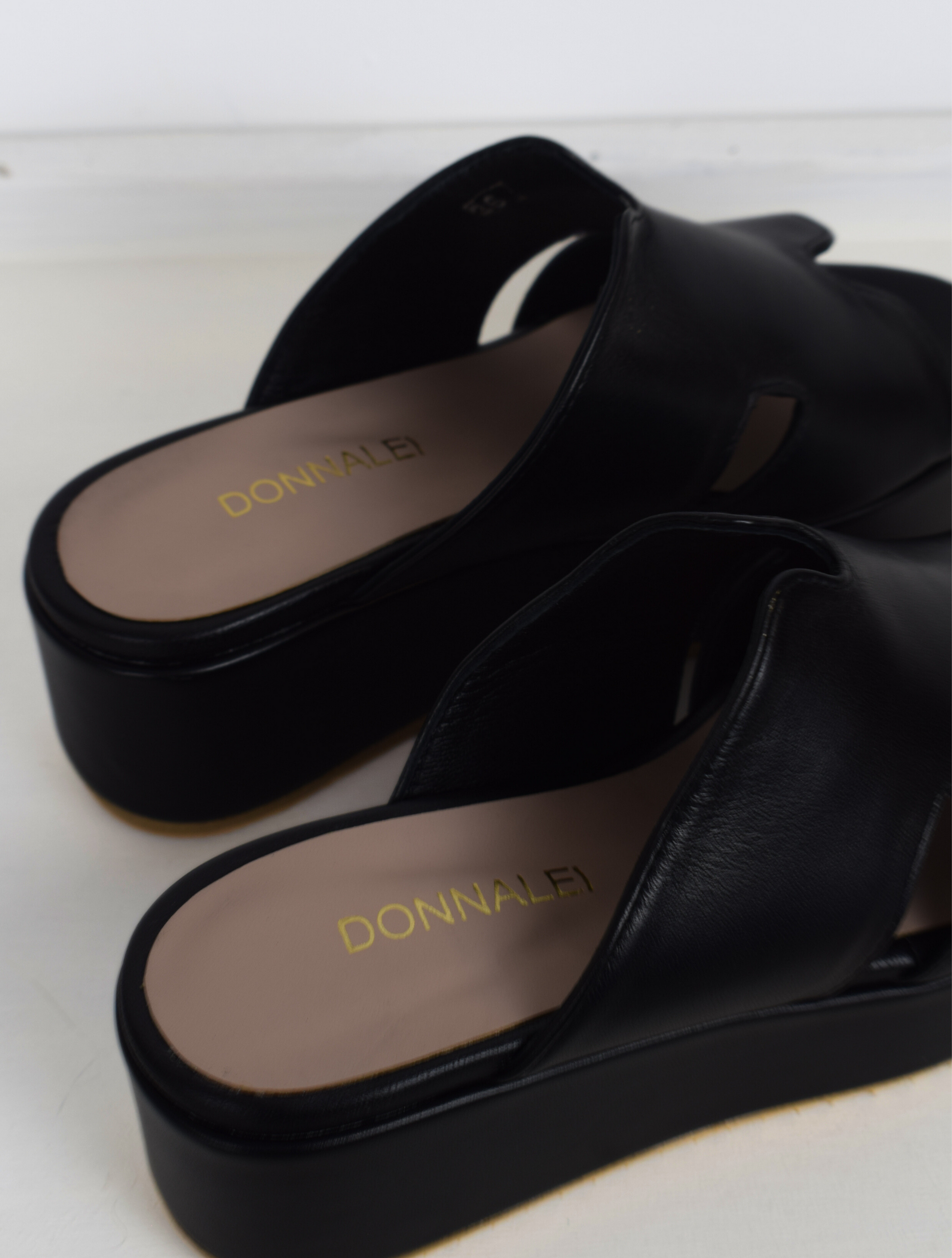 Black sandals with a large platform 