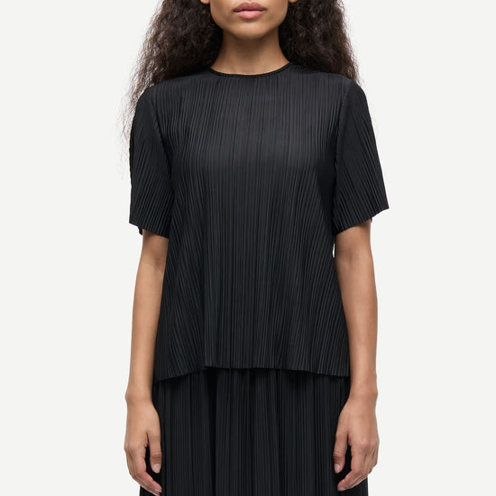 short sleeve pleated black top with round neck from samsoe samsoe model shot