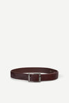 Maroon belt with a silver buckle on a white background