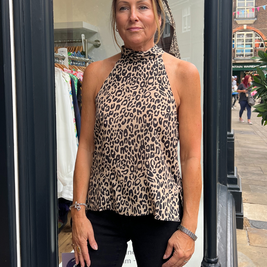 High neck leopard print top with no sleeves 