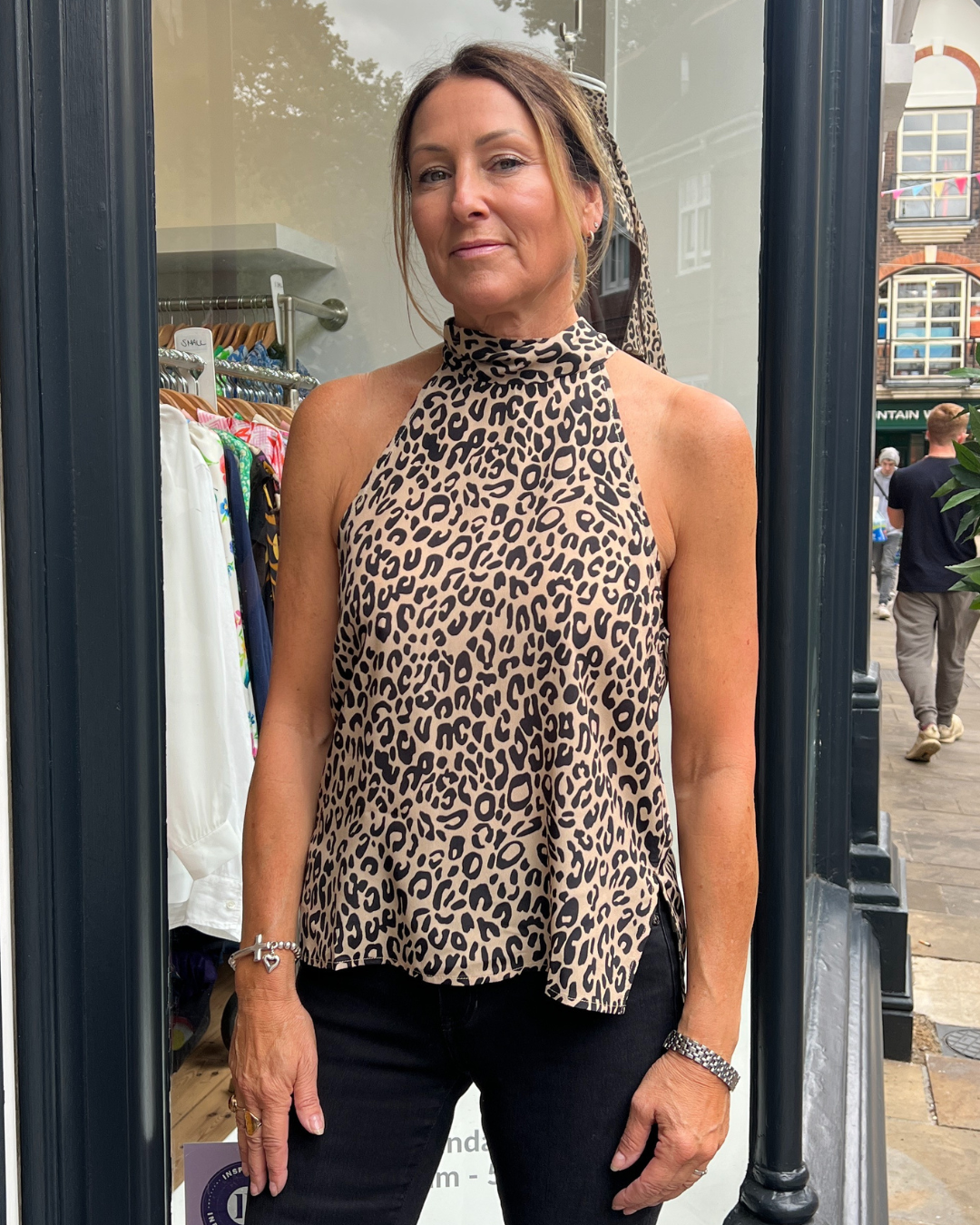 High neck leopard print top with no sleeves 