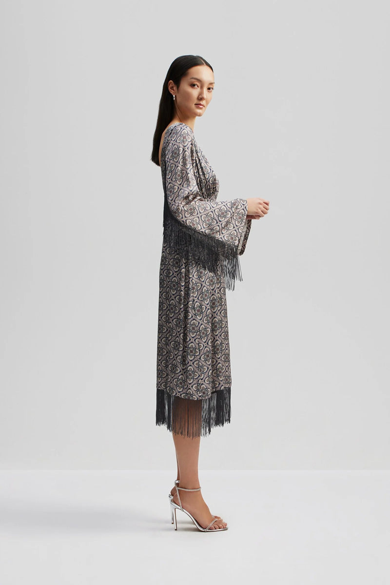 Blue grey and brown tile print fabric midi skirt with long fluted sleeves and fringe detail
