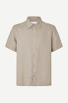 Beige short-sleeve shirt by Samsoe Samsoe on a white background