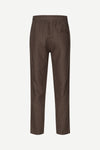 Brown trousers by Samsoe Samsoe on a white background rear view