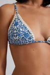 Triangle string bikini top with blue and white floral print and crotch trim