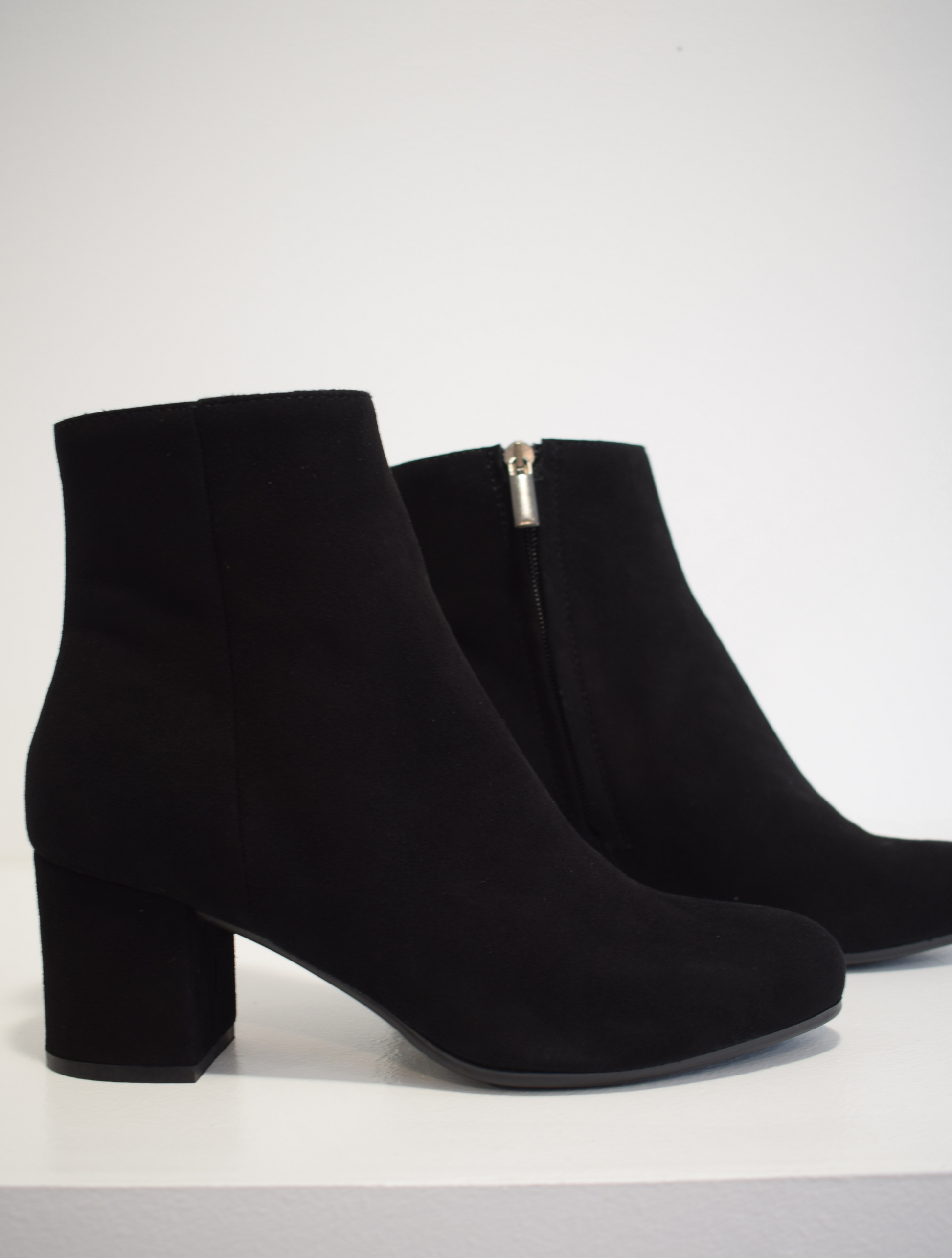 black suede ankle boot with side zip and almond toe