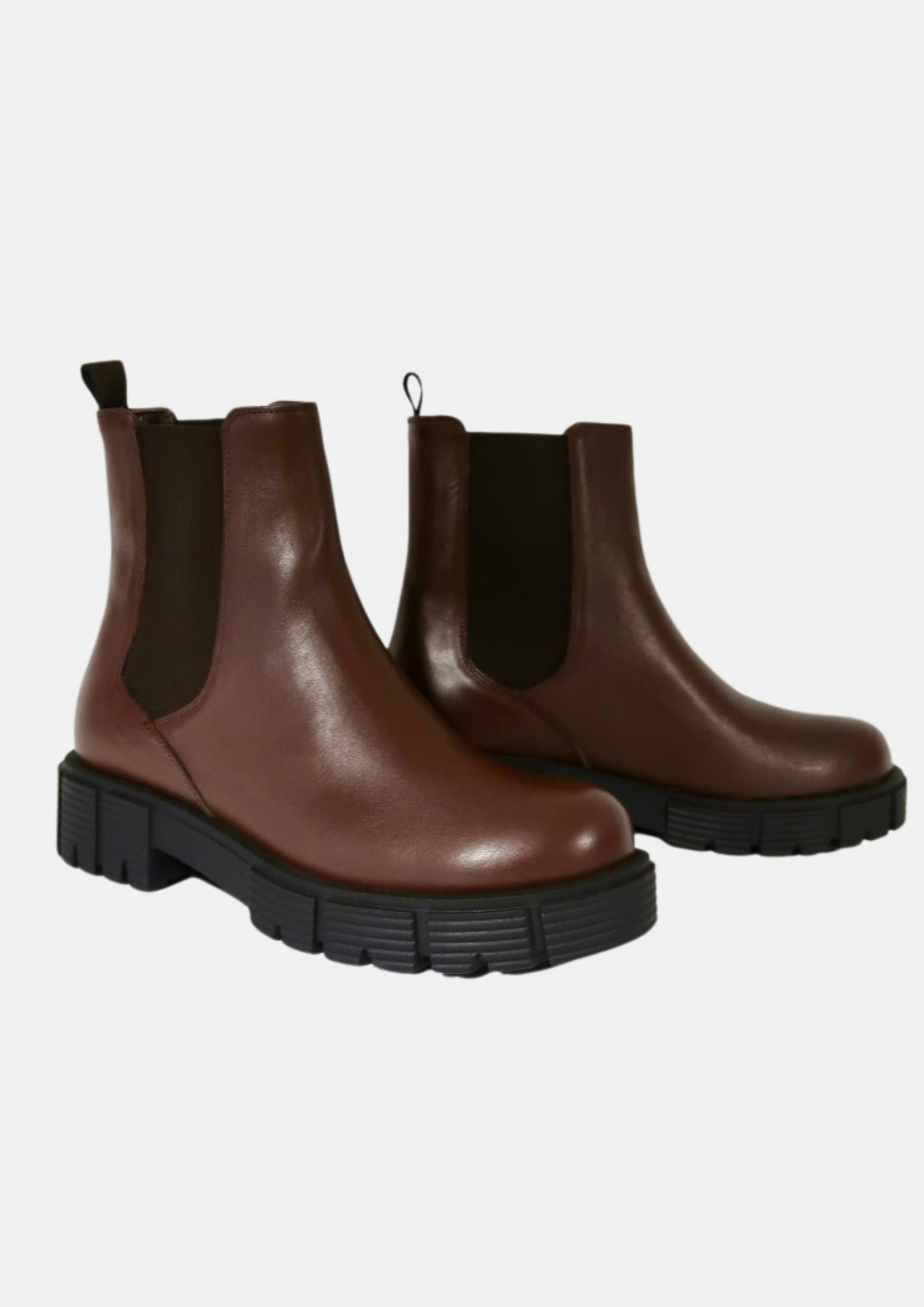 chocolate brown boots with rubber sole and elasticated tabs side view 