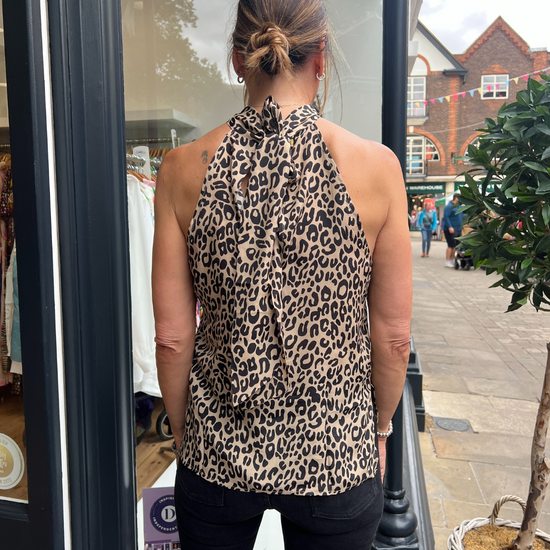 High neck leopard print top with no sleeves 