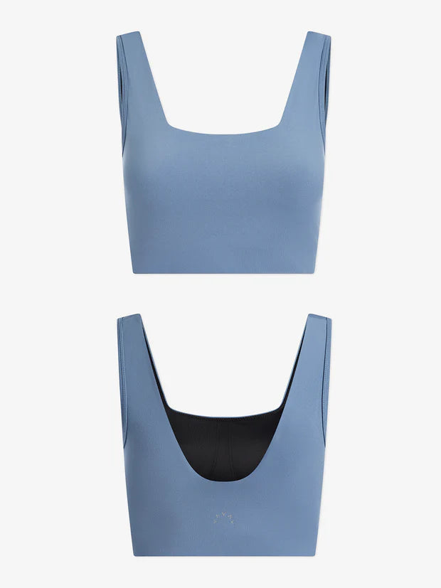 Blue sports bra top with square neckline and scoop back